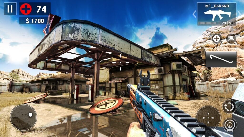 Feature image for our best Android zombie games feature. It shows a screen from Dead Trigger 2, with a player facing a run down gas station with barrier set up. The player is holding a blue firearm.